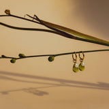 Celebrate you. Oorbel - Groen met zoetwaterparel - shopvinoos